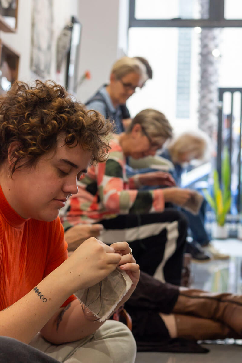 Guests stitching as part of Fabrication finissage